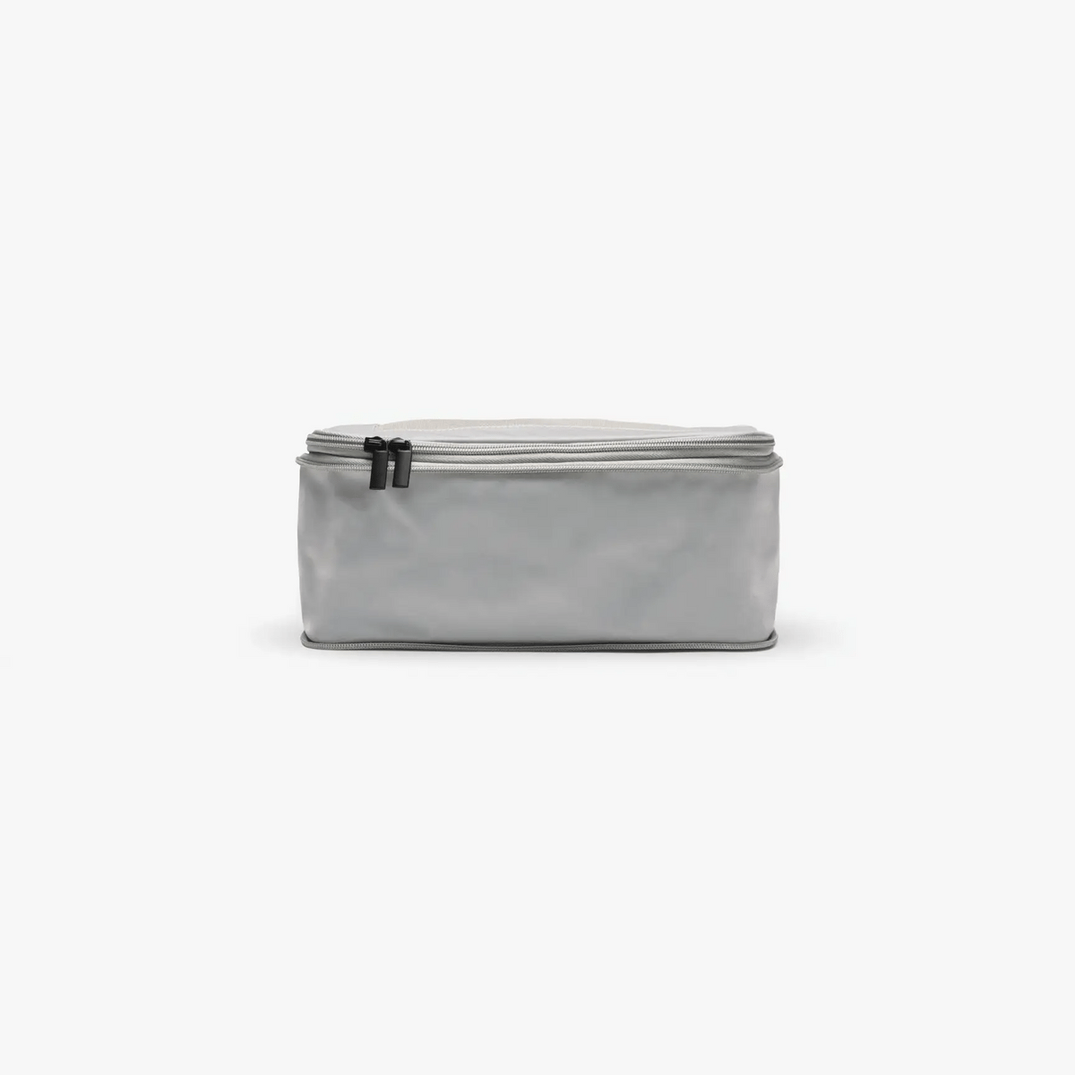 ALTAIR packing cube being compressed with its zip