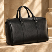 Grained leather and stitching on the black ALTAIR travel bag