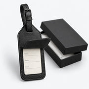Back of the black ALTAIR luggage tag with its concealed contact card